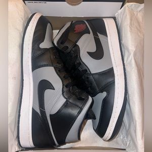 Air Jordan 1 mid. Size 11.5 men’s. Color black/grey.